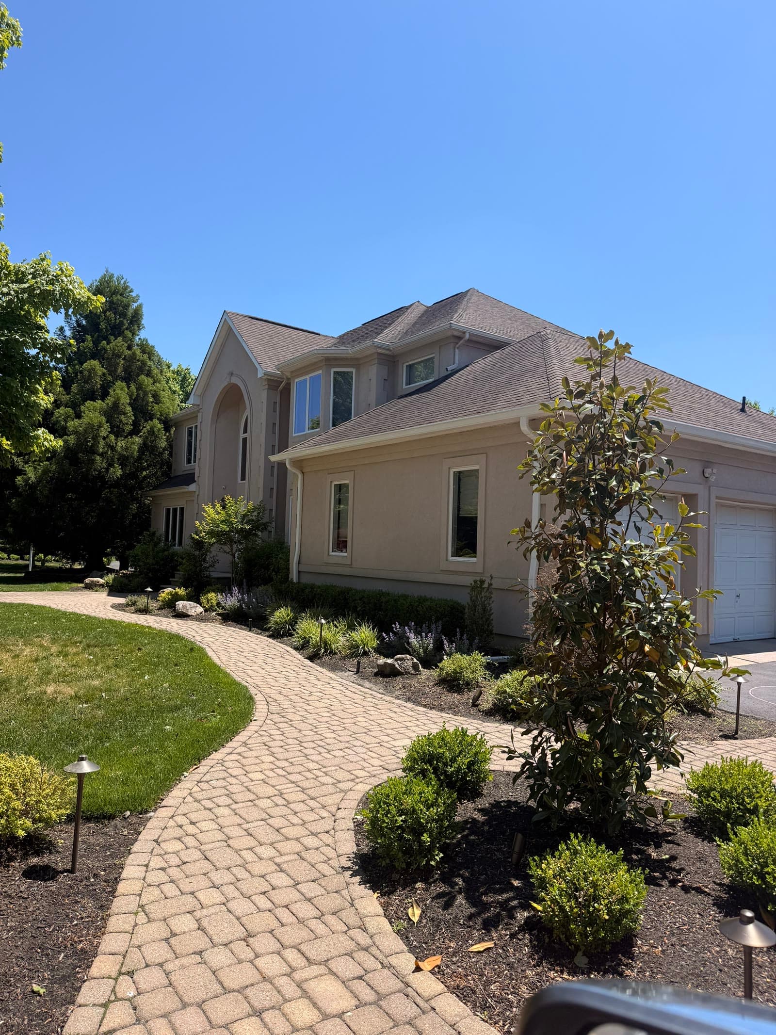 Upscale stucco home, paver drive, finished — Green Apple Roofing, New Jersey