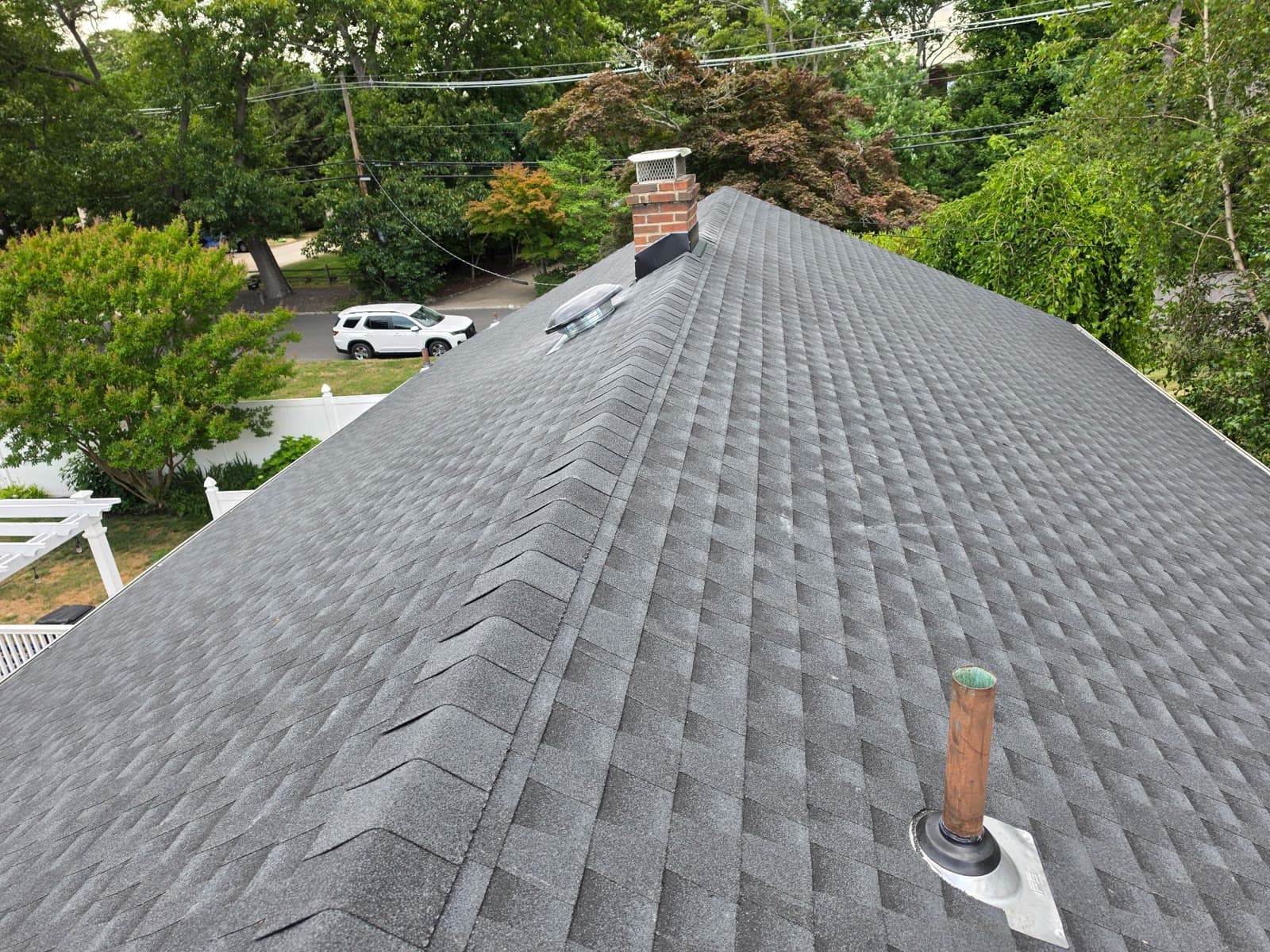 Finished gray ridge, chimney and vents — Green Apple Roofing, New Jersey