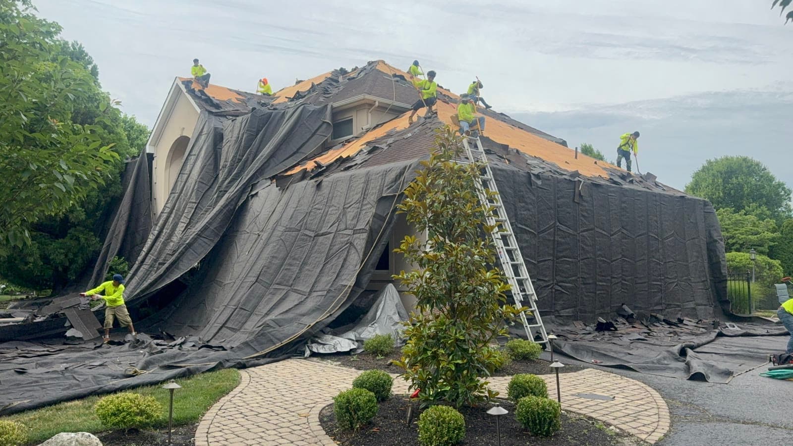 Luxury home tarped, crew on roof — Green Apple Roofing, New Jersey