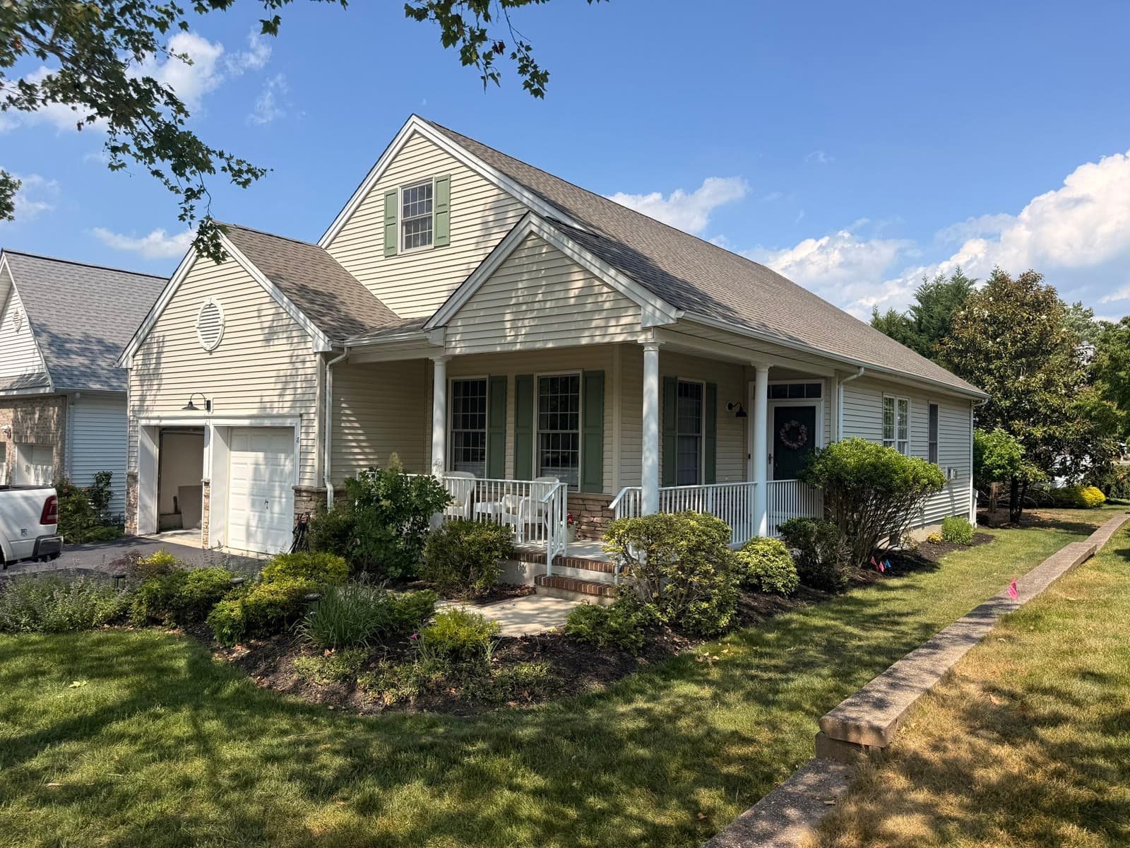 Cape-style home with a new roof and porch — Green Apple Roofing, New Jersey