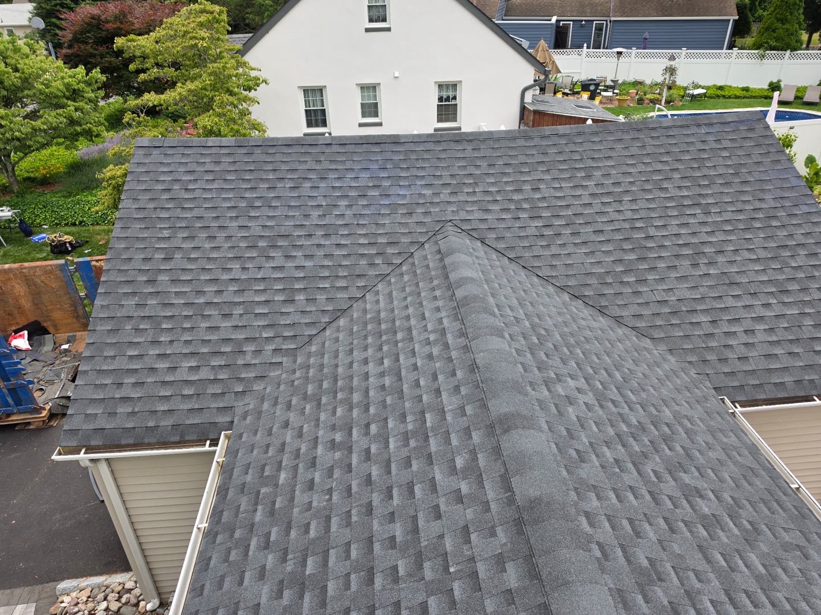 A finished architectural shingle roof completed by Green Apple Roofing in New Jersey