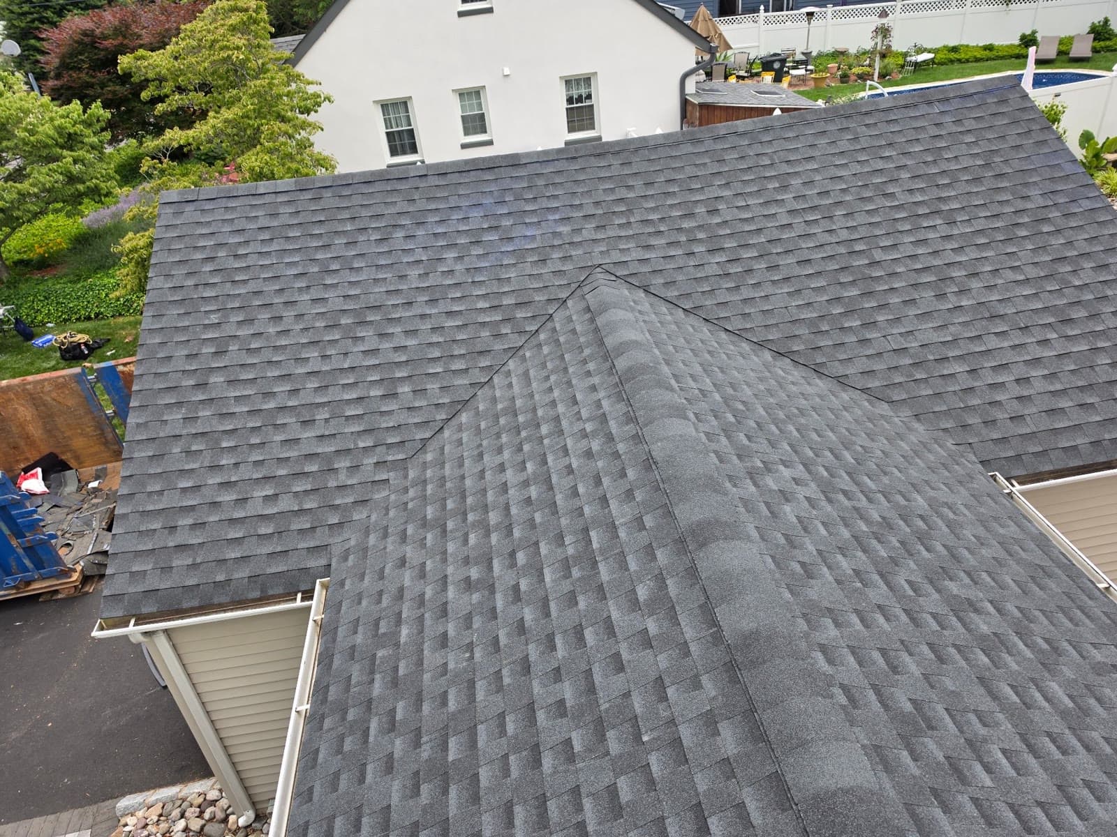 An aerial view of a finished roof by Green Apple Roofing in New Jersey