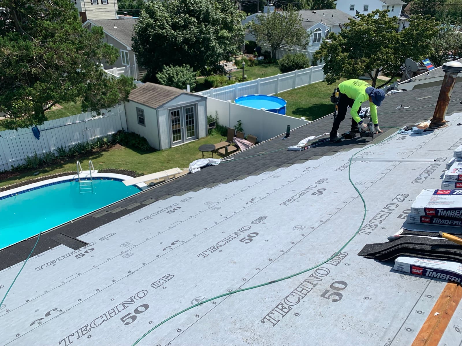 A New Jersey residential exterior completed by Green Apple Roofing